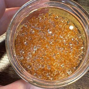 Sparkling amber colored glass, flat back rhinestones